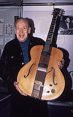 Les Paul with his "log" solid body electric guitar.
