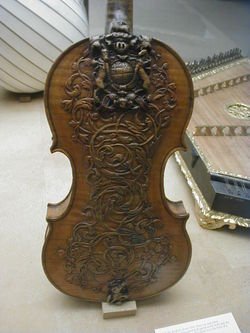 An intricately carved 17th century (believed 1665) so called 'King James' by Ralph Agutter, British Royal Family violin, on display in the Victoria and Albert Museum in London.